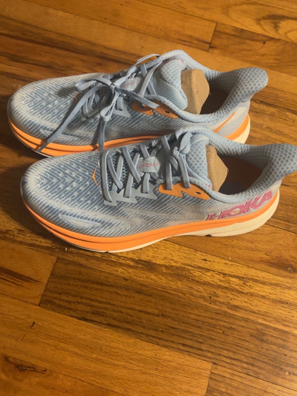 Hoka Women’s Light Blue and Orange Cushioned Running Sneakers